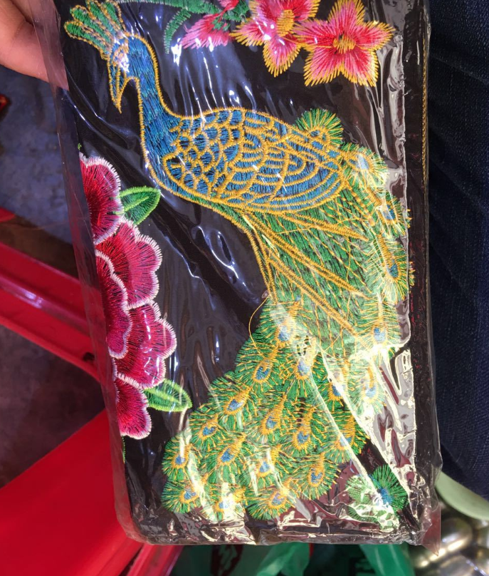 Enchanting Feathered Splendor Wallets | wallet | Indulge in the allure of timeless elegance with our exquisite Embroidered Peacock Wallets. Crafted w