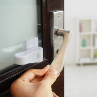 Baby door handle safety lock | baby care | 
 Product name: child door handle safety lock
 
 Material: ABS material
 
 Size: 70*35*50 (error 2MM