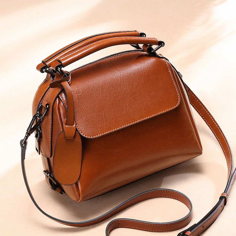 Leather Women Handbag zipper pocket, mobile phone bag, document bag.