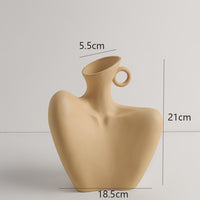 Artisan Ceramic Sculpture Vase  | Introducing the Home Décor Sculpture Ceramic Vase! This beautiful vase is made of high quality cera
