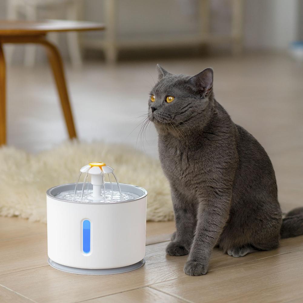 Pet Drinking Fountain Dispenser  | Introducing our Pet Drinking Fountain Dispenser - the ultimate solution for keeping your beloved pet