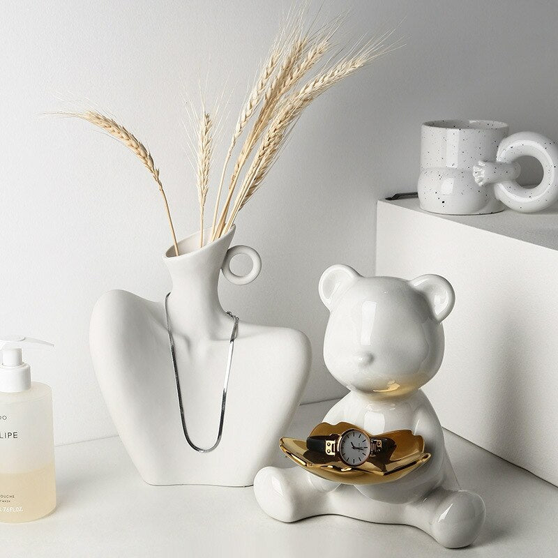 Artisan Ceramic Sculpture Vase  | Introducing the Home Décor Sculpture Ceramic Vase! This beautiful vase is made of high quality cera